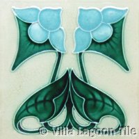 Embossed polychrome tile