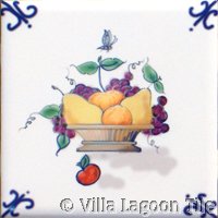 small fruit on delft tile