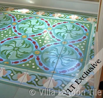 Cement tile floor with fish and shells