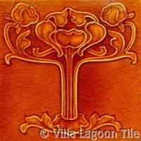 orange glazed art nouveau ceramic tile