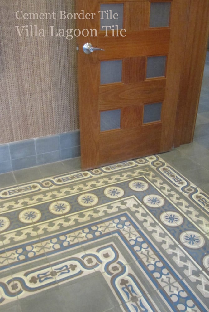 A very deep encaustic cement tile border at the corner of a room using Caribbean Collection and Cuban Heritage Collection border patterns.
