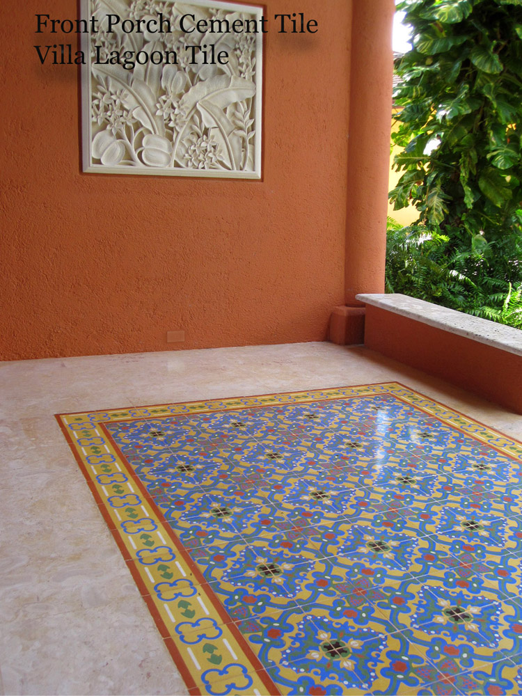Cement tile rug pattern on a porch, using Villa Lagoon Tile's Caribbean Collection patterns "Sousa" and 