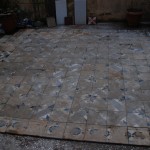antique cement tile before cleaning