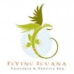 A logo of a stylized iguana with wings, representing the Flying Iguana Taqueria & Tequila Bar of Neptune Beach, FL