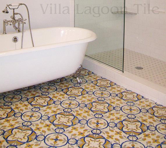 Custom cement tile from Villa Lagoon Tile, paired with a clawfoot tub for a beautiful bathroom.