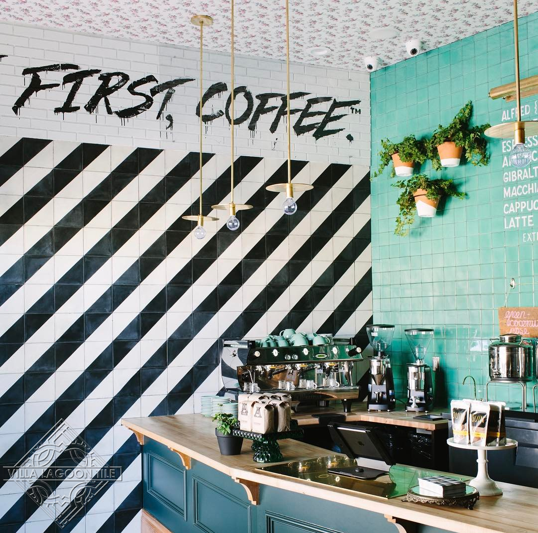 Coffee house with bold black and white stripes created by Villa Lagoon Tiles Man Overboard cement tile.