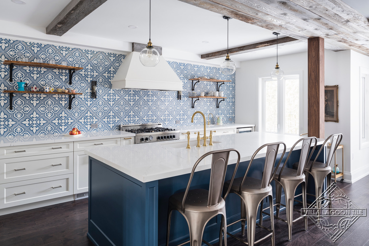 Open kitchen with Lancelot blue cement tile backsplash and feature wall 