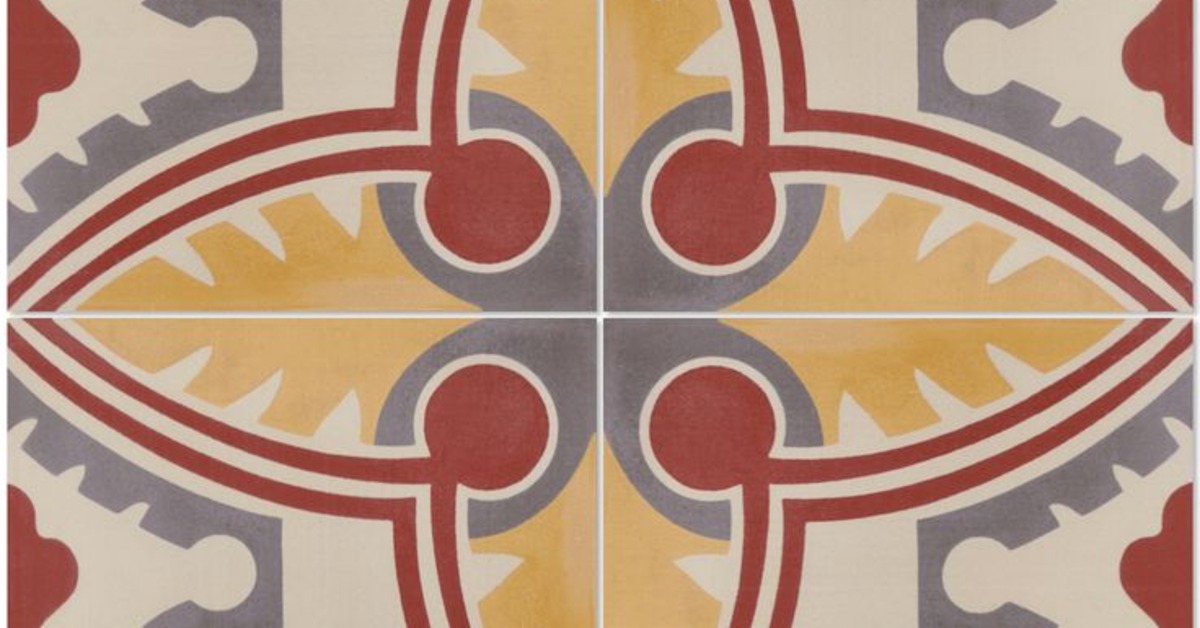 A close up of a tile pattern. There are yellow, blue, and red colores used in the design.