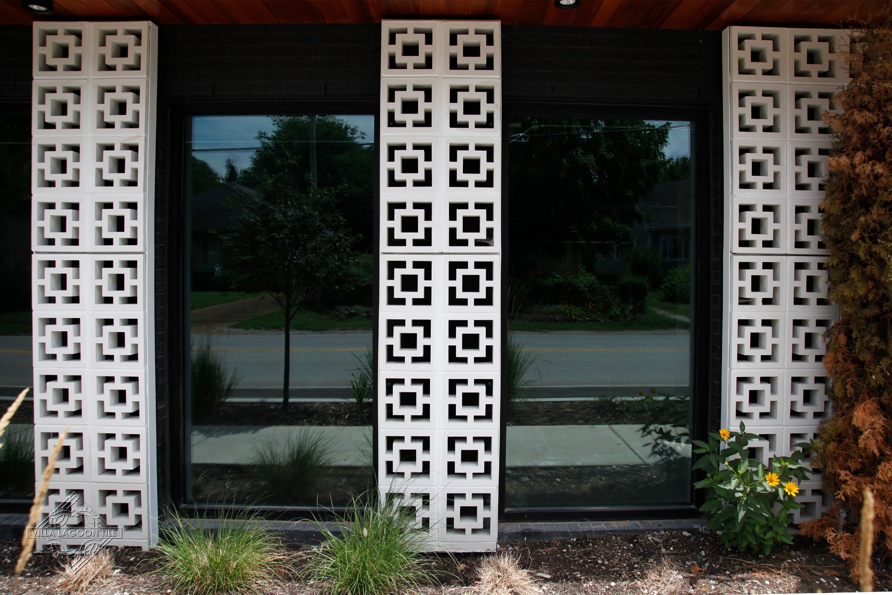 Symmetrical Facade of Large Tonga Breeze Block Pillars and Glass Storefronts in Nashville