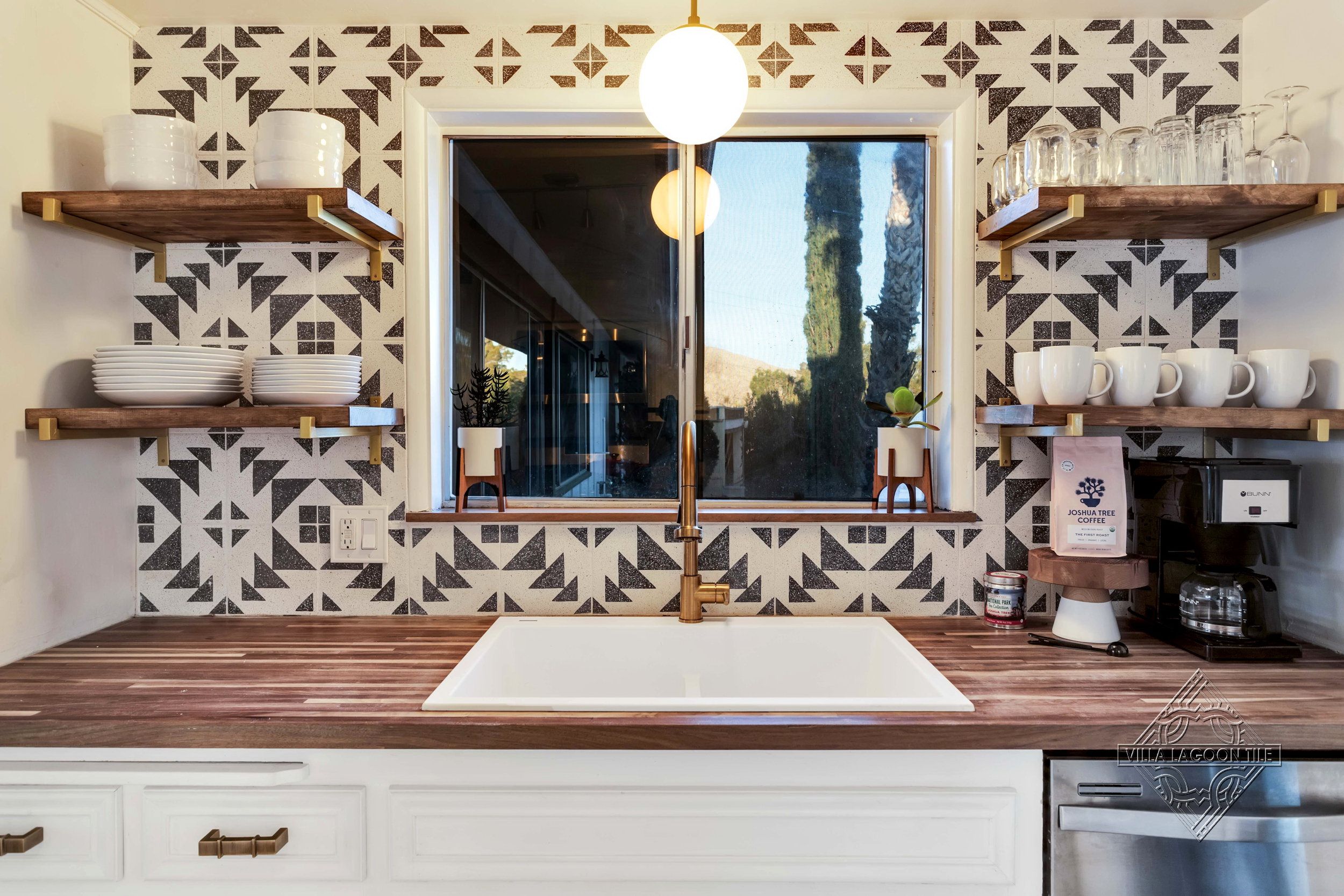 Symmetrical Desert Kitchen Design with Code Talker Terrazzo and Walnut Floating Shelves