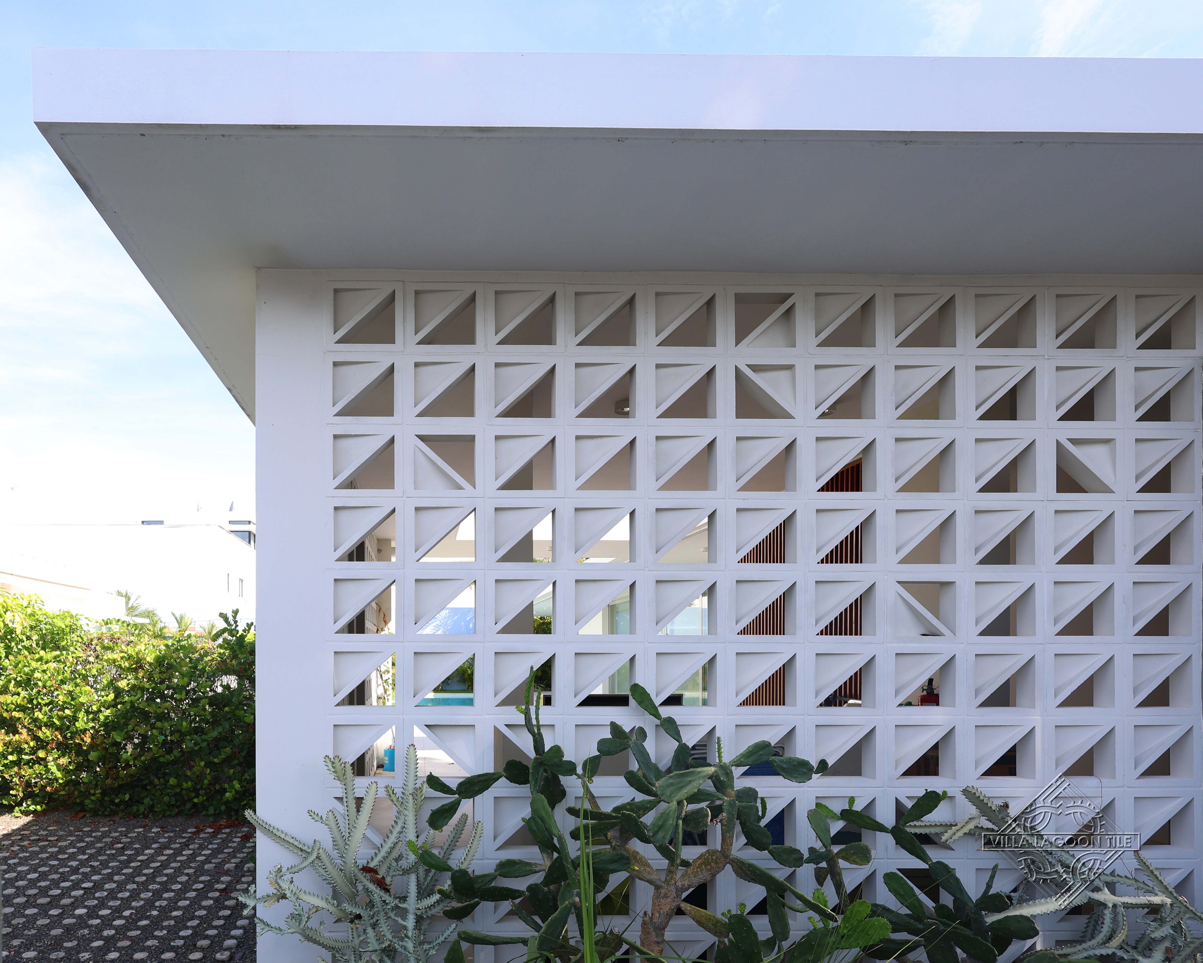 Passive Solar Elegance: Large Bermuda Breeze Blocks in the Lantern House