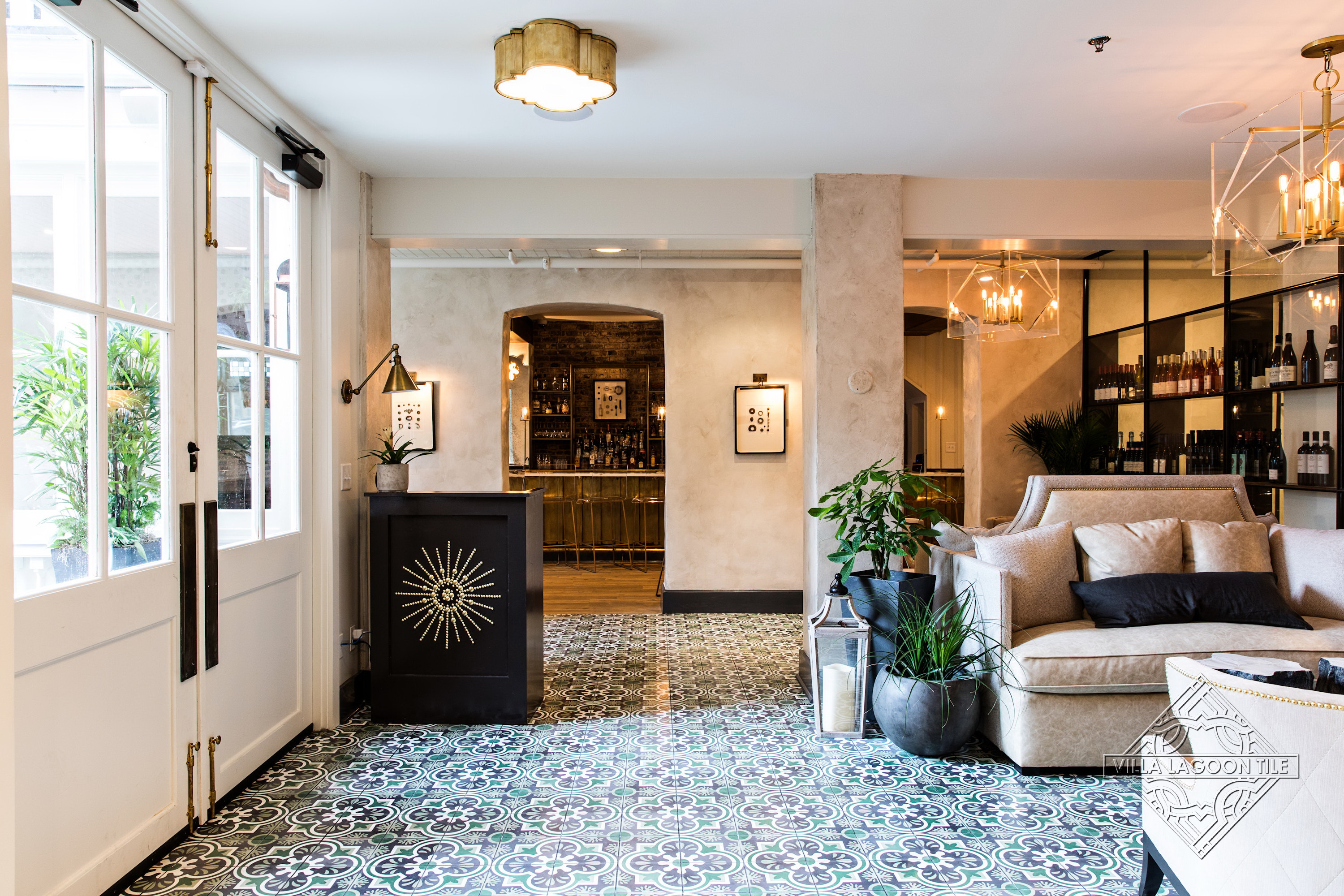 Upscale Restaurant Interior: Boutique Lobby and Hostess Station featuring Artisan Patterned Cement Tile Flooring