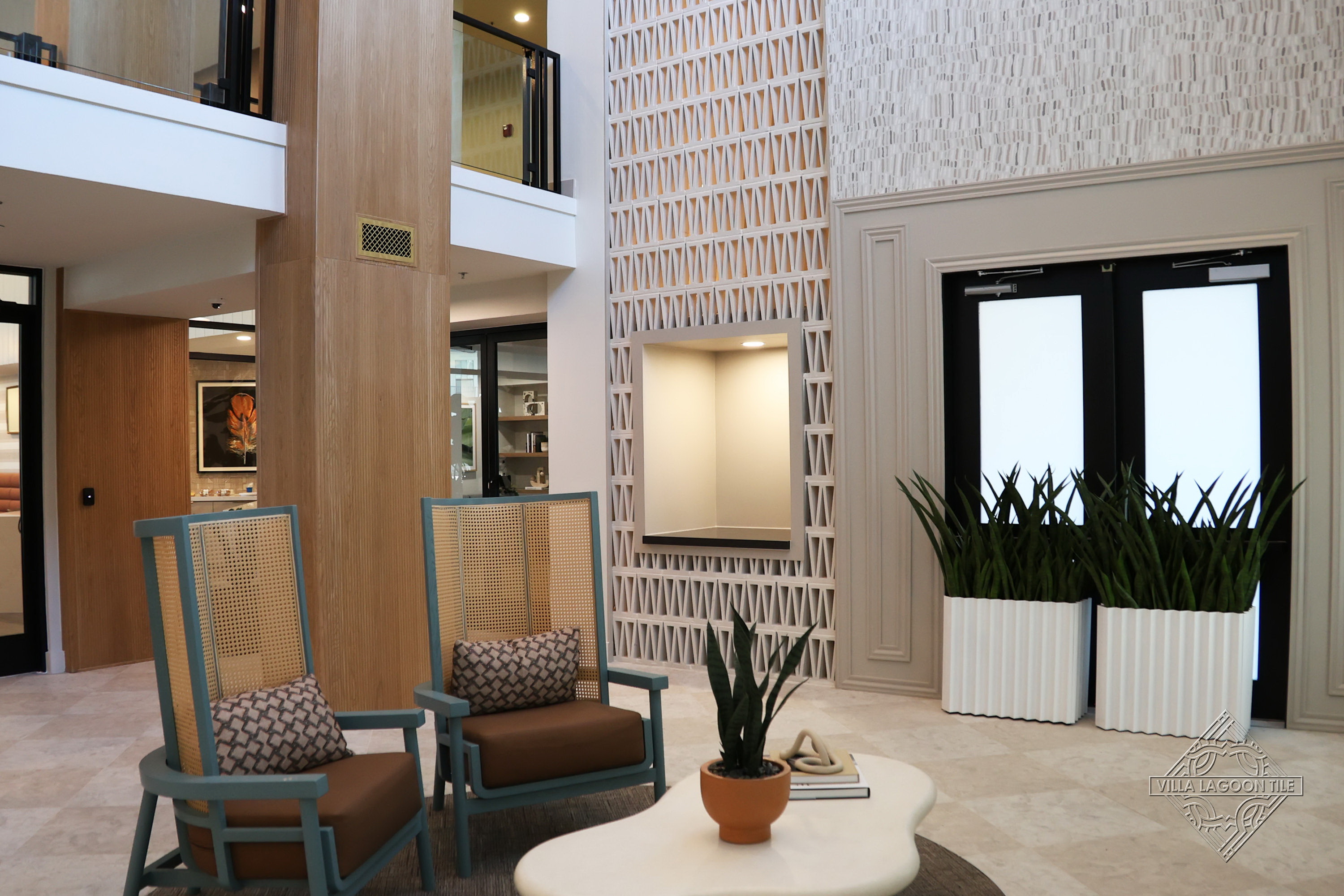 Contemporary Residential Lobby Lounge with Fluted Planters and Architectural Breeze Block Screen