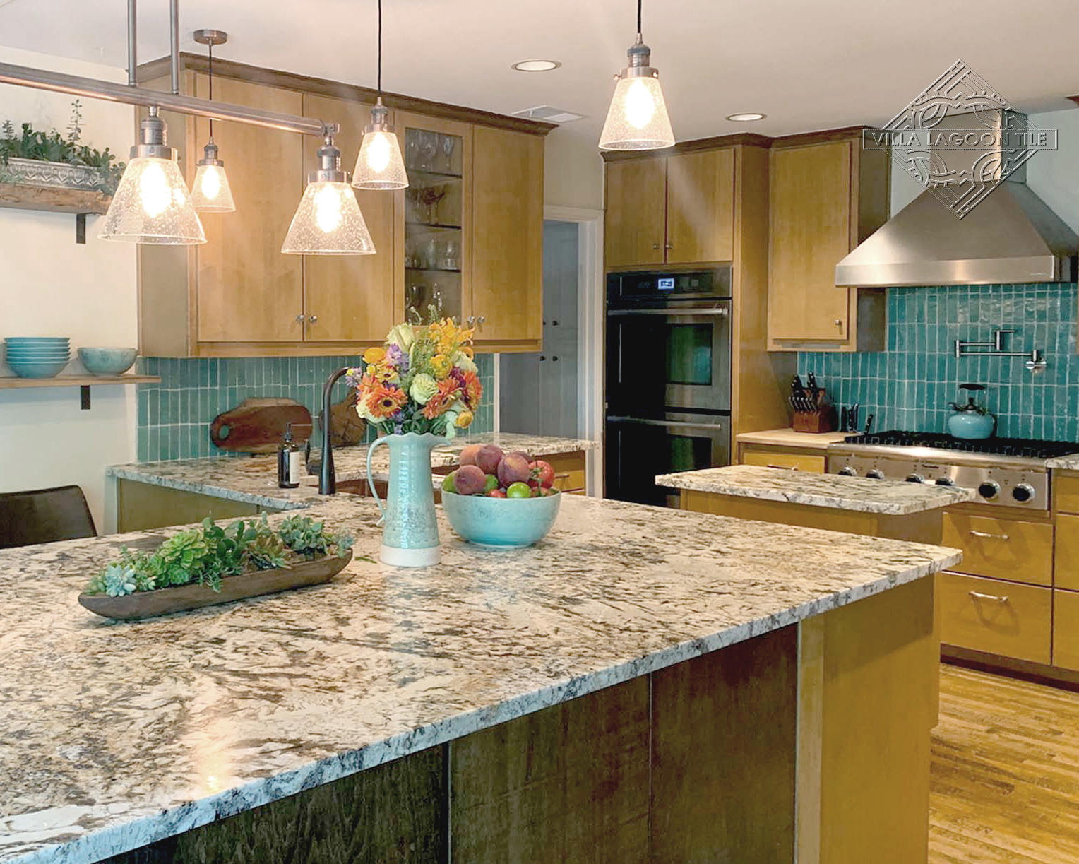 Open Concept Kitchen Design with Teal Zellige Subway Tile Backsplash