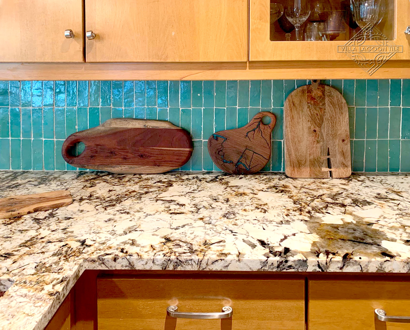 Granite Countertop and Teal Bejmat Zellige Tile Kitchen Backsplash