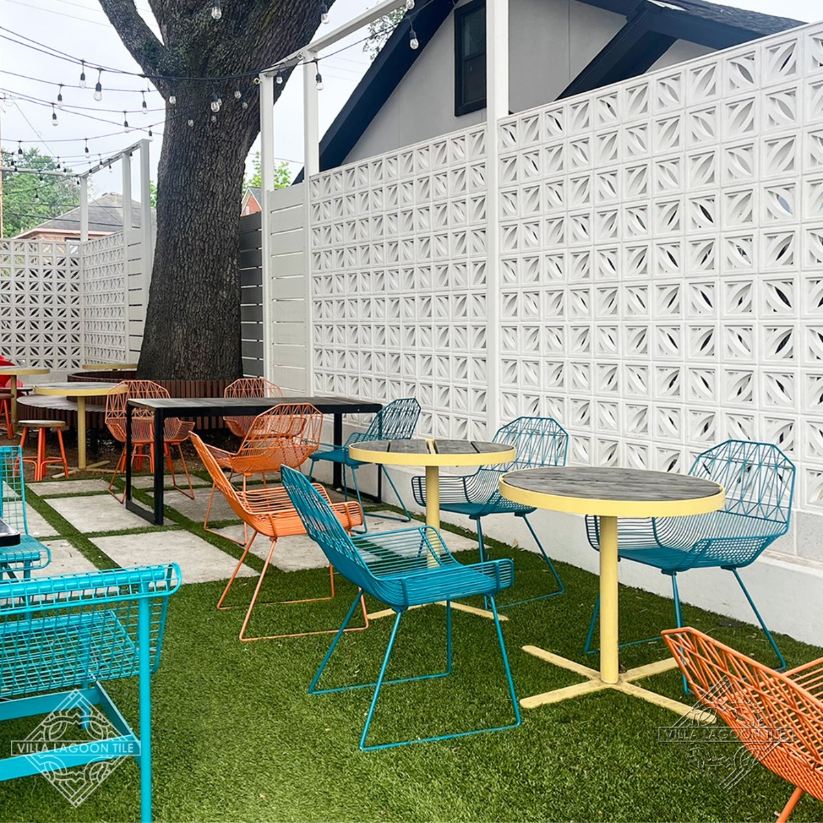 Modern Commercial Patio with White Breeze Block Privacy Wall & Mid-Century Outdoor Furniture