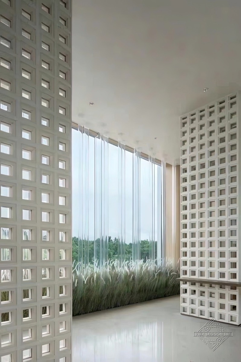 Minimalist Commercial Interior with Floor-to-Ceiling Breeze Block Feature Walls