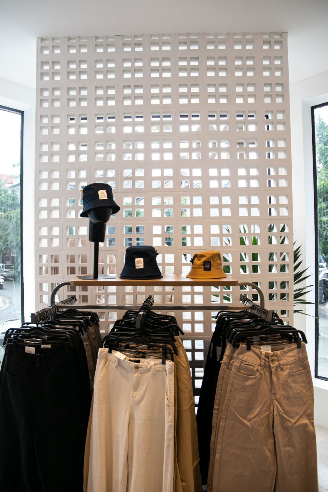 Boutique Retail Display Against a White Breeze Block Partition
