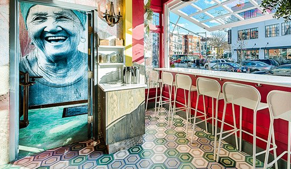 Colorful Concentric Hex Cement Tile on a restaurant floor, by Villa Lagoon Tile.