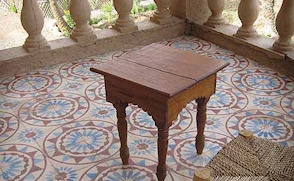 A beautiful dusty pink Moroccan cement tile balcony, photographed on a Villa Lagoon Tile research tour.