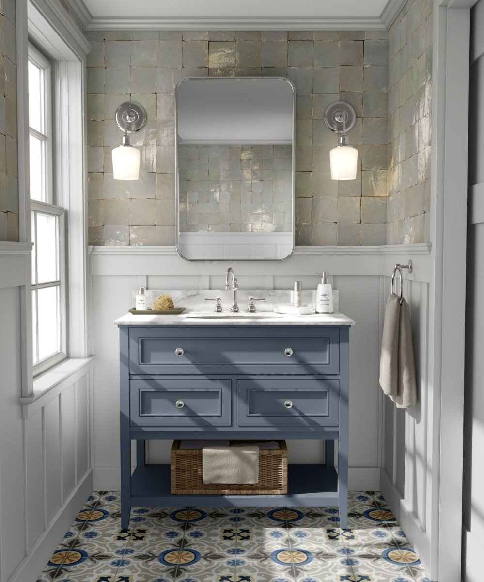 Villa Lagoon Tile handmade cement tile, paired with our handmade Moroccan Zellige, in a beautiful powder room.